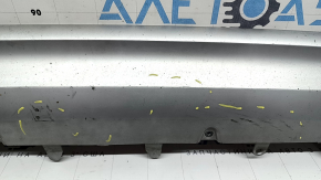 The front bumper lip of the Volvo XC90 16-19 is worn and scratched.