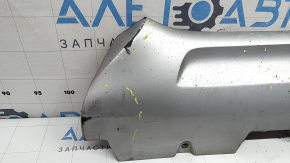 The front bumper lip of the Volvo XC90 16-19 is worn and scratched.