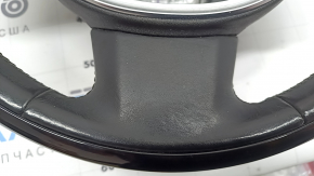The steering wheel is bare, Volvo XC90 16-26, black leather, Classic wood / Flame birch wood, without paddles, bumps on the leather, cracks in the wood trim.