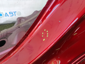 The left central body pillar of a Toyota Prius 50 16-22 is sawn off, with a slope, bumps, and a dented slope.