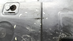 The front left underbody protection of the Volvo XC90 16-26 is worn and torn.