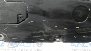 The front left underbody protection of the Volvo XC90 16-26 is worn and torn.