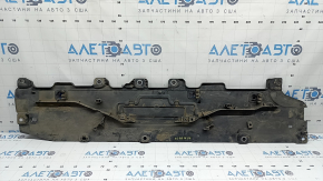 The front left underbody protection of the Volvo XC90 16-26 is worn and torn.