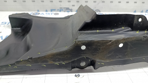 The right side engine guard for a Toyota Prius 50 19-22 is dented and scuffed.