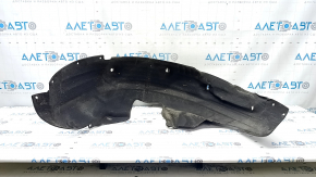 The rear right fender liner of a Hyundai Tucson 19-21 has torn fasteners.