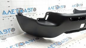 The rear bumper, bare middle section, Mazda CX-50 23-26, structure without parking sensors.