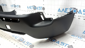 The rear bumper, bare middle section, Mazda CX-50 23-26, structure without parking sensors.