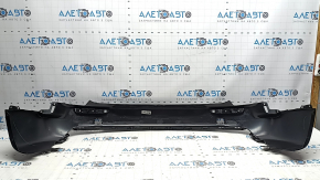 The rear bumper, bare middle section, Mazda CX-50 23-26, structure without parking sensors.