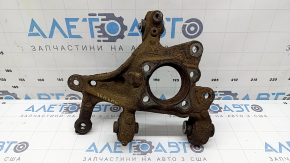 The rear left axle of a Toyota Prius 50 19-22 AWD is rusty, has a cut, and the bushing needs replacing.