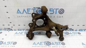 The rear left axle of a Toyota Prius 50 19-22 AWD is rusty, has a cut, and the bushing needs replacing.
