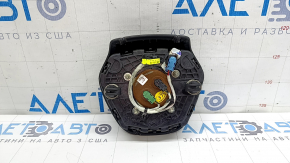 The BMW X7 G07 19-26 steering wheel airbag, black, scratched, and rusty squib