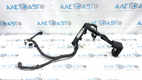 The positive terminal of the Hyundai Tucson 16-21 battery with housing and wiring.