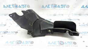 The front left fender liner, lower part, BMW X7 G07 19-26, is dented and has tears.