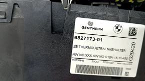 Heated and cooled cup holder for BMW X7 G07 19-26 with black and chrome trim, scratches