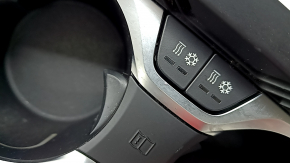 Heated and cooled cup holder for BMW X7 G07 19-26 with black and chrome trim, scratches