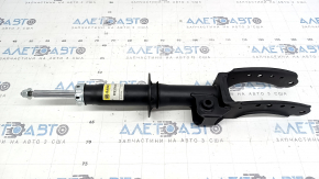 The front right shock absorber of the Audi Q7 4L 10-15 has a leaking seal.