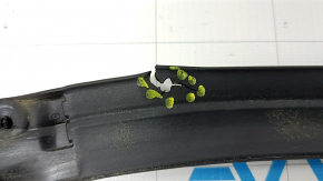 The front hood seal on a Mazda 6 14-21 is torn.
