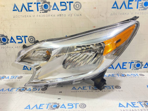 Left front headlight of a pre-restored Nissan Versa Note 13-16, scratched