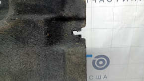 The left underbody protection of the BMW X3 G01 18-24 is dented and torn.