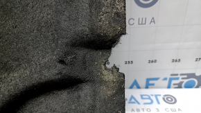 The left underbody protection of the BMW X3 G01 18-24 is dented and torn.
