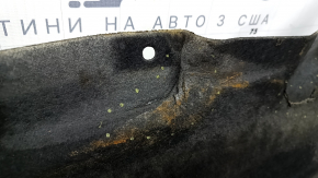 The left underbody protection of the BMW X3 G01 18-24 is dented and torn.