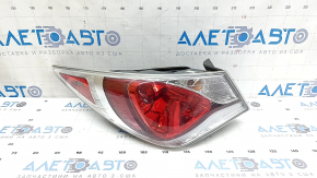 Left outer fender light of a Hyundai Sonata 11-15 hybrid, scratches