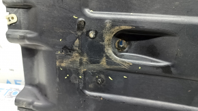 The rear left underbody protection of the BMW X3 G01 18-24 is dented.