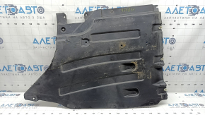 The rear right underbody protection of the BMW X3 G01 18-24 is dented and worn.