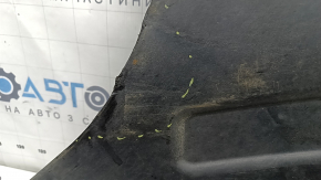 The rear right underbody protection of the BMW X3 G01 18-24 is dented and worn.