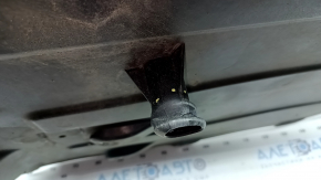 The rear right underbody protection of the BMW X3 G01 18-24 is dented and worn.