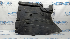 The rear right underbody protection of the BMW X3 G01 18-24 is dented and worn.