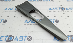 The center console trim for the multimedia joystick for the BMW 4 F32/33/36 14-20 is in light carbon fiber, the coating is peeling off.