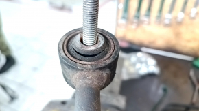 The rear right control arm of a Hyundai Sonata 11-15 has a torn silent block.
