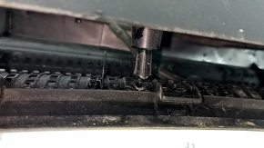 The plastic windshield wiper grille on a Hyundai Sonata 11-15 has a broken mount.