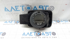 The fuel filler door housing of a Hyundai Sonata 11-15 has broken fasteners and a torn seal.