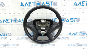 The steering wheel is bare, Hyundai Sonata 11-15, black rubber, with buttons and overlays, scratches.