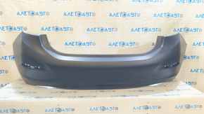 The rear bumper is bare for a Chevrolet Cruze 16, without parking sensors.