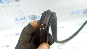 The front left door seal of a Hyundai Sonata 20-22 has torn fasteners.
