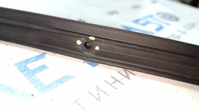 The front right door seal of a Hyundai Sonata 20-22 has torn fasteners.