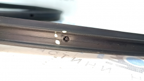 The front right door seal of a Hyundai Sonata 20-22 has torn fasteners.