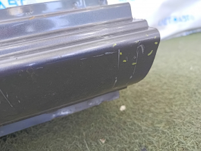 The center right pillar of a 1992 Nissan Versa (USA) is sawn off, has dents, and has a dent.