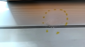 The front left door of a Hyundai Sonata 20-23, white, WC9, has dents.