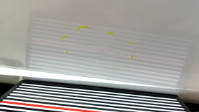 The front left door of a Hyundai Sonata 20-23, white, WC9, has dents.