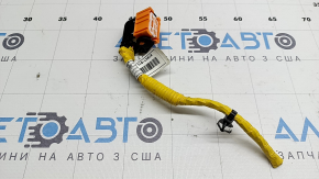 The Hyundai Sonata 20 SRS airbag computer module chip is orange.