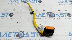 The Hyundai Sonata 20 SRS airbag computer module chip is orange.