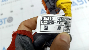 The Hyundai Sonata 20 SRS airbag computer module chip is orange.