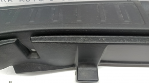 Mitsubishi Outlander 22-26 black trunk opening trim with chrome trim, with a plug for the lock hook, the chrome trim has peeled off, scratches