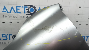 Mitsubishi Outlander 22-26 front left fender, plastic, silver U25, torn, dented, glued, in need of repair