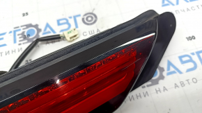 Mitsubishi Outlander 22-26 left inner tailgate light scratched