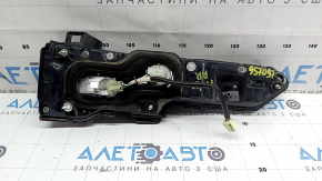 The right Mitsubishi Outlander 22-26 trunk door inner light has a cracked mount and scratches.